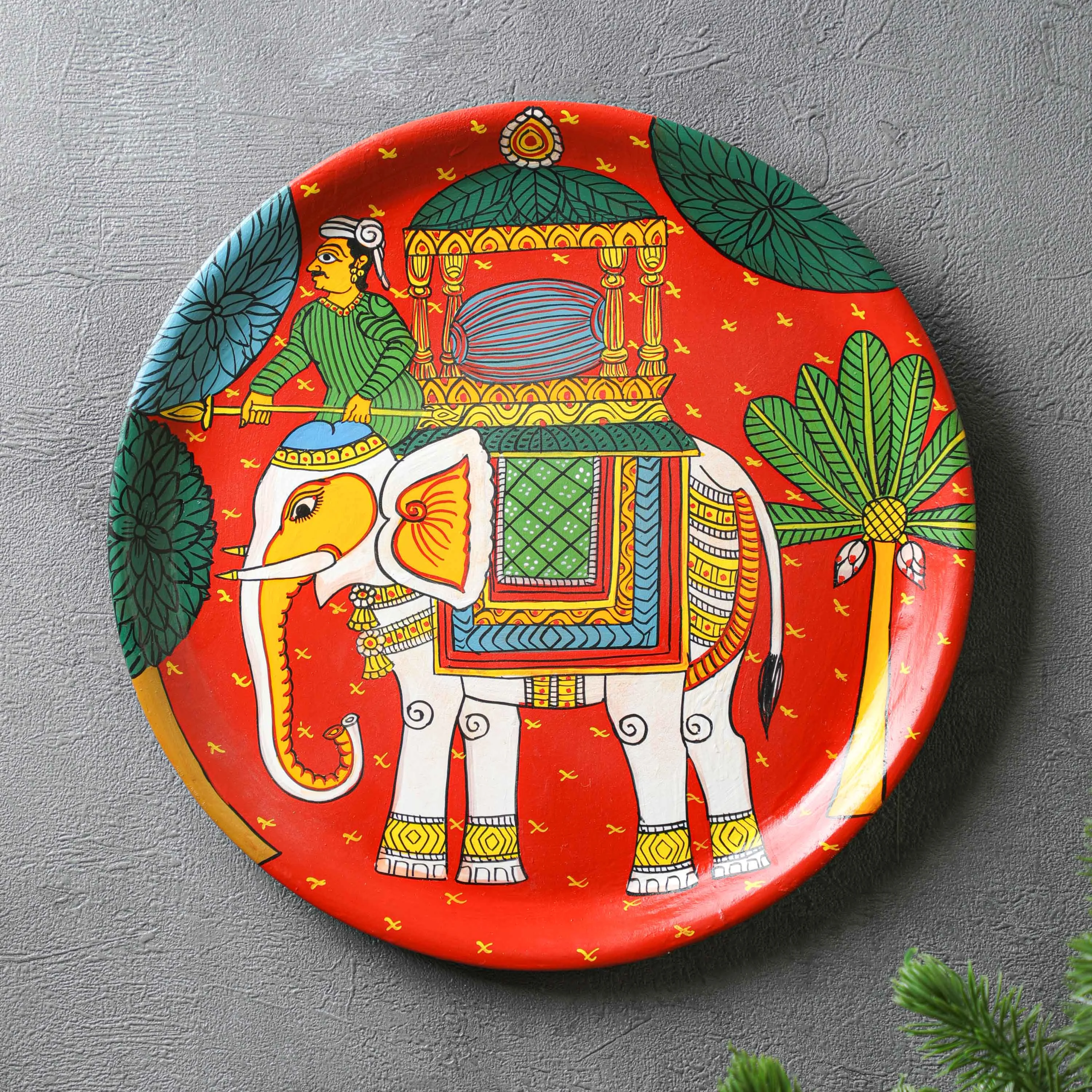 Material: This vibrant cheriyal wall plate &nbsp;is hand-painted using natural colours on a canvas, stretched over a plate