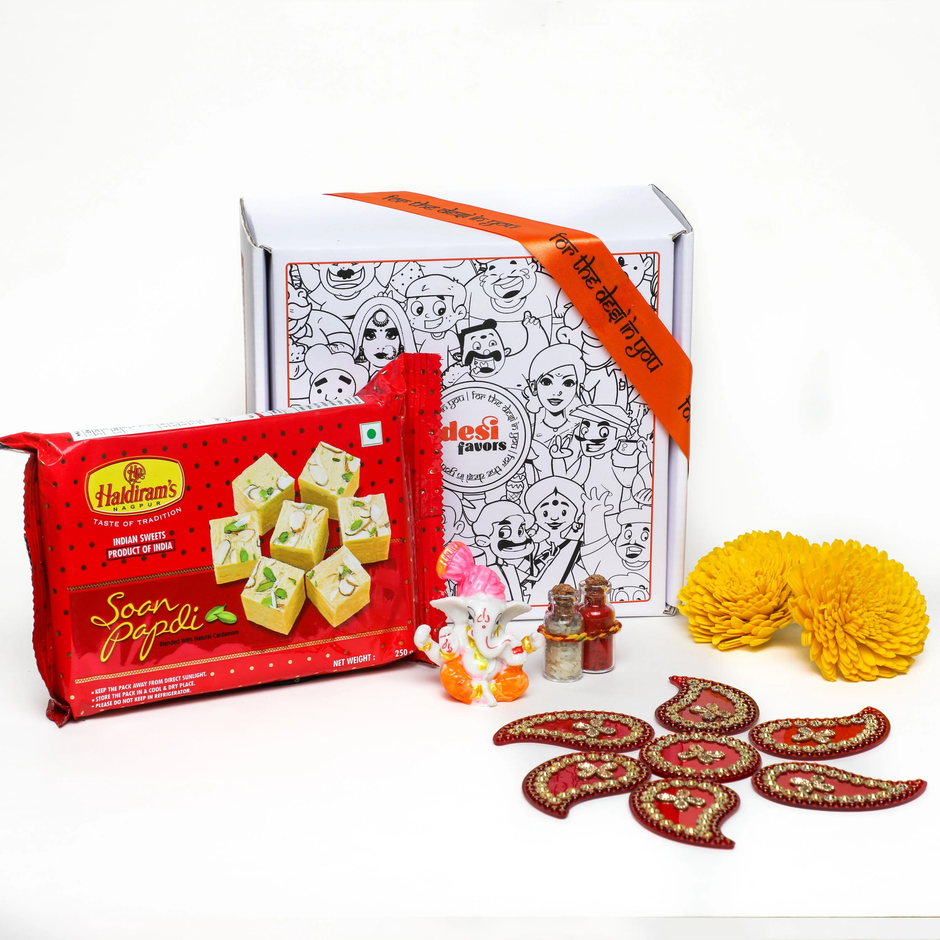 Rangoli Set + Ganesha Idol + &nbsp;Shola Flowers + Roli Chawal + Soan Papdi box