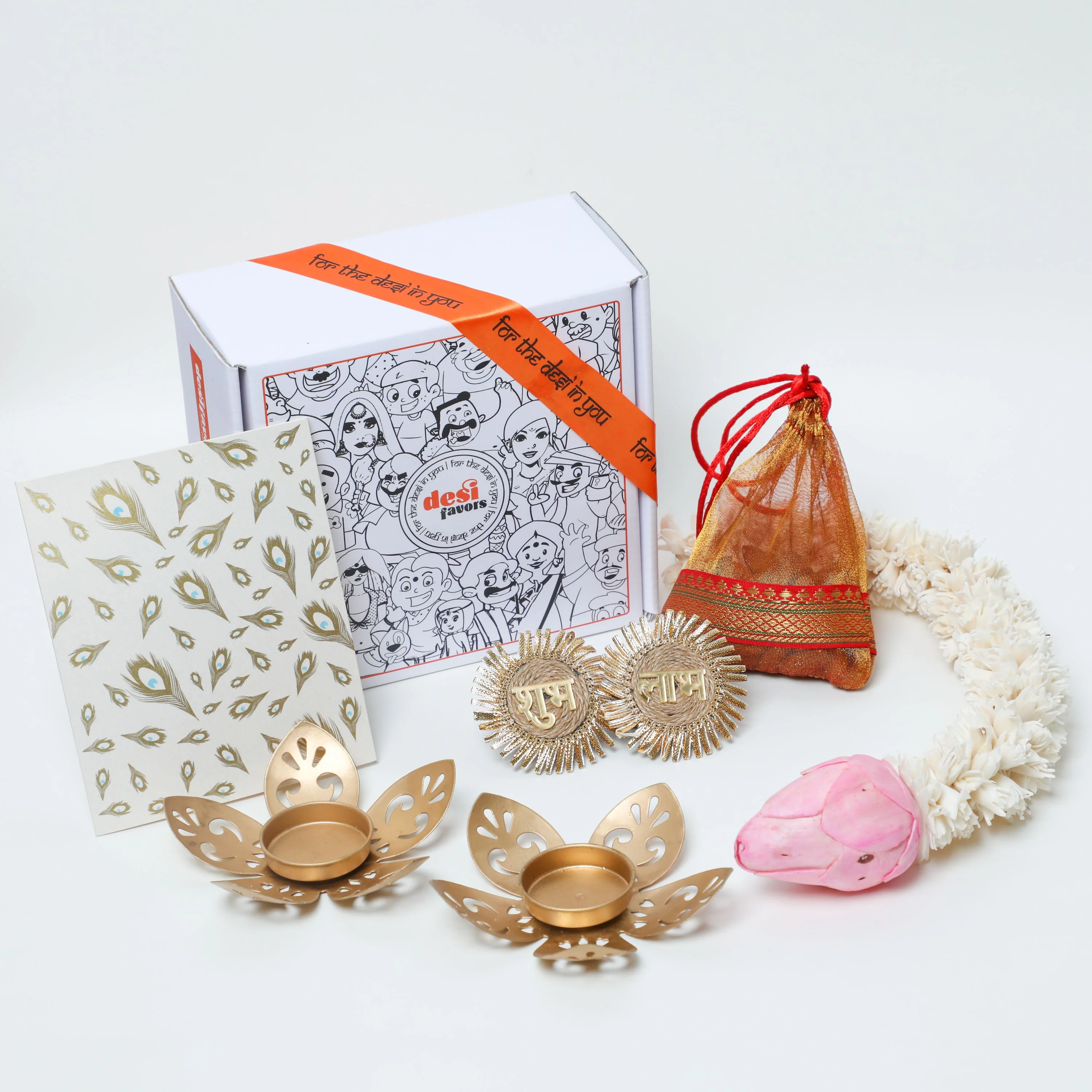 2 Metal diyas + Dry fruits + 1 ft lotus string + Shubh Labh stickers + Dry fruits + Diwali Card