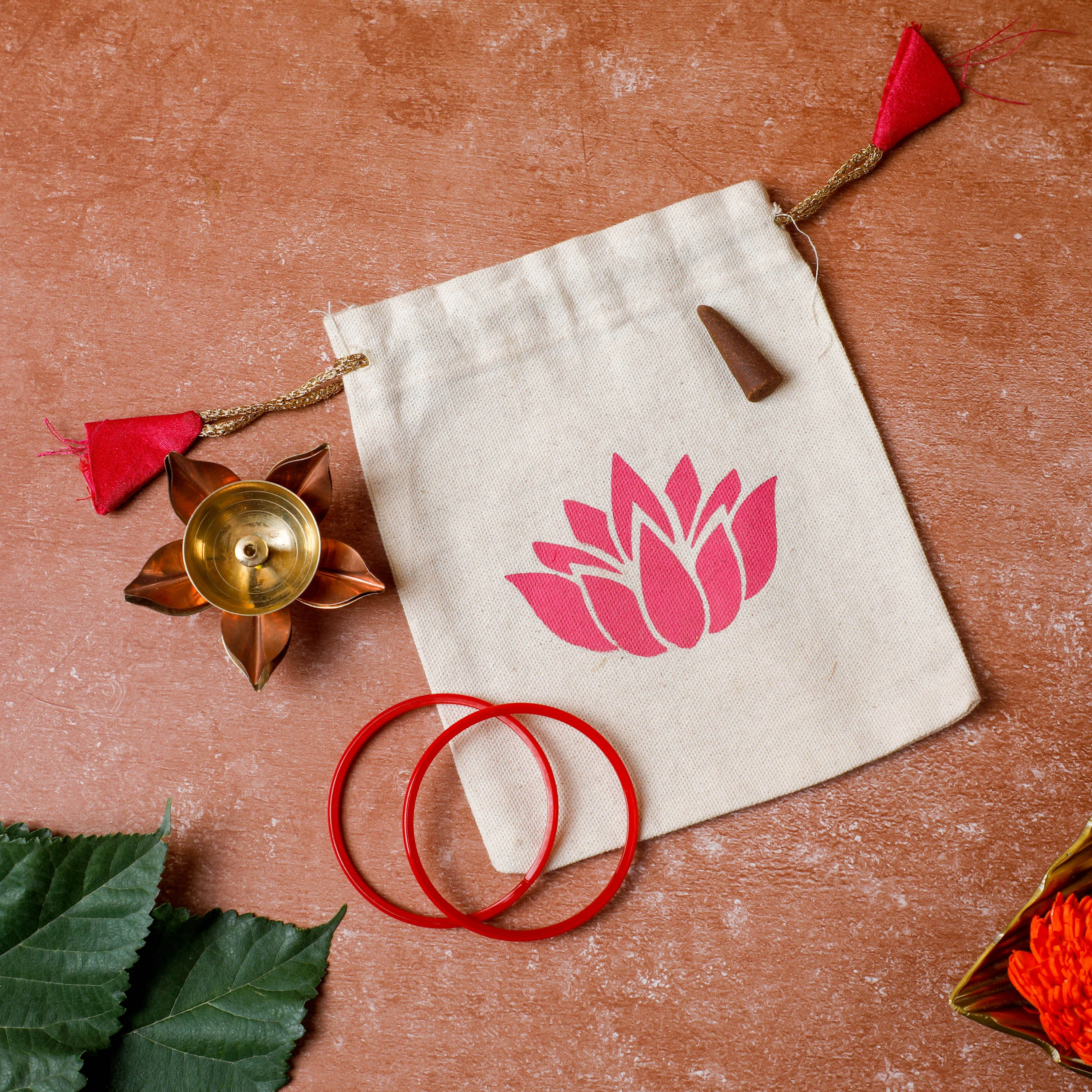 1 Lotus bag+ 1 Brass deepam 