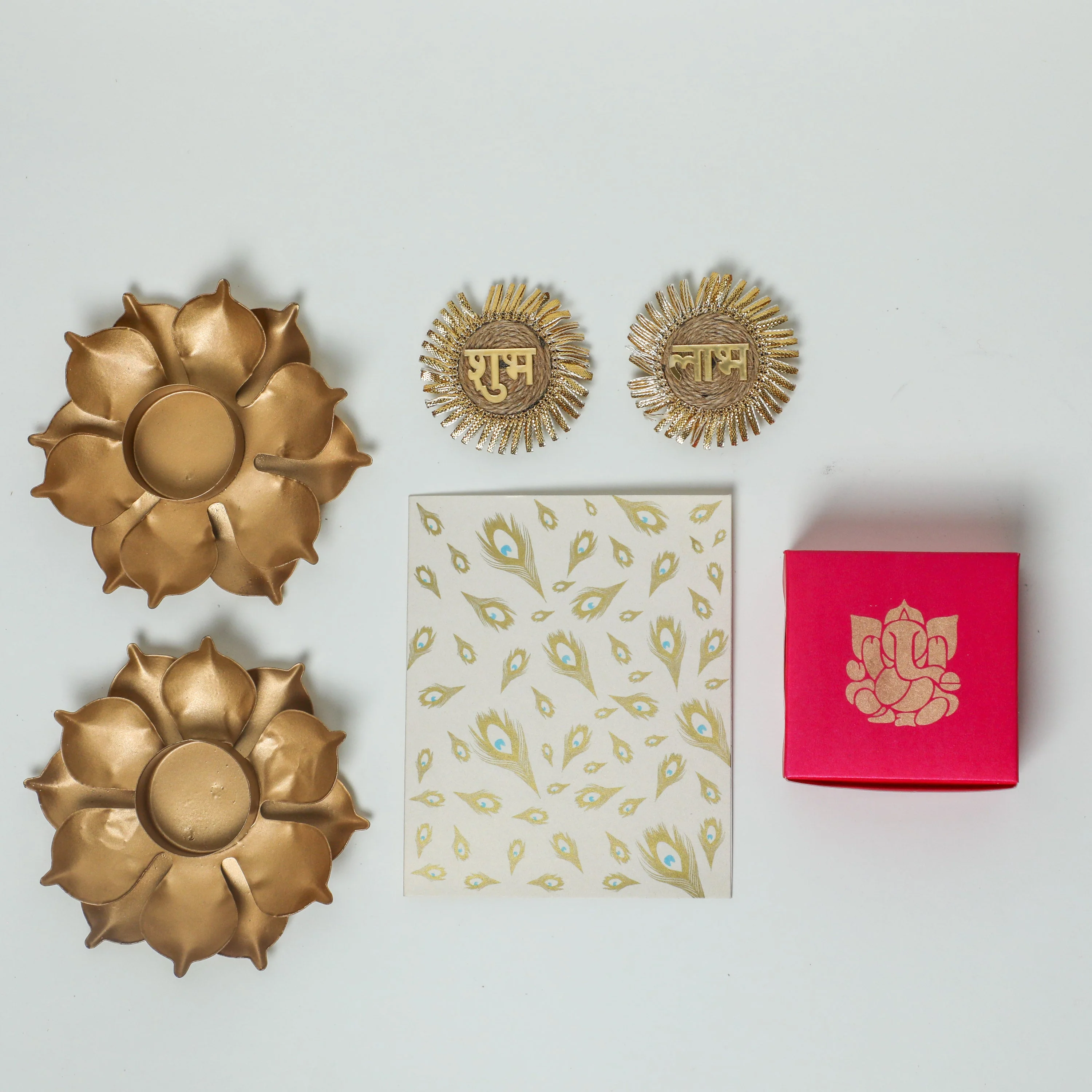 2 Lotus metal tealight holder + Small Ganesha box with dry fruits +&nbsp;&nbsp;Shubh Labh +&nbsp;Greeting Card