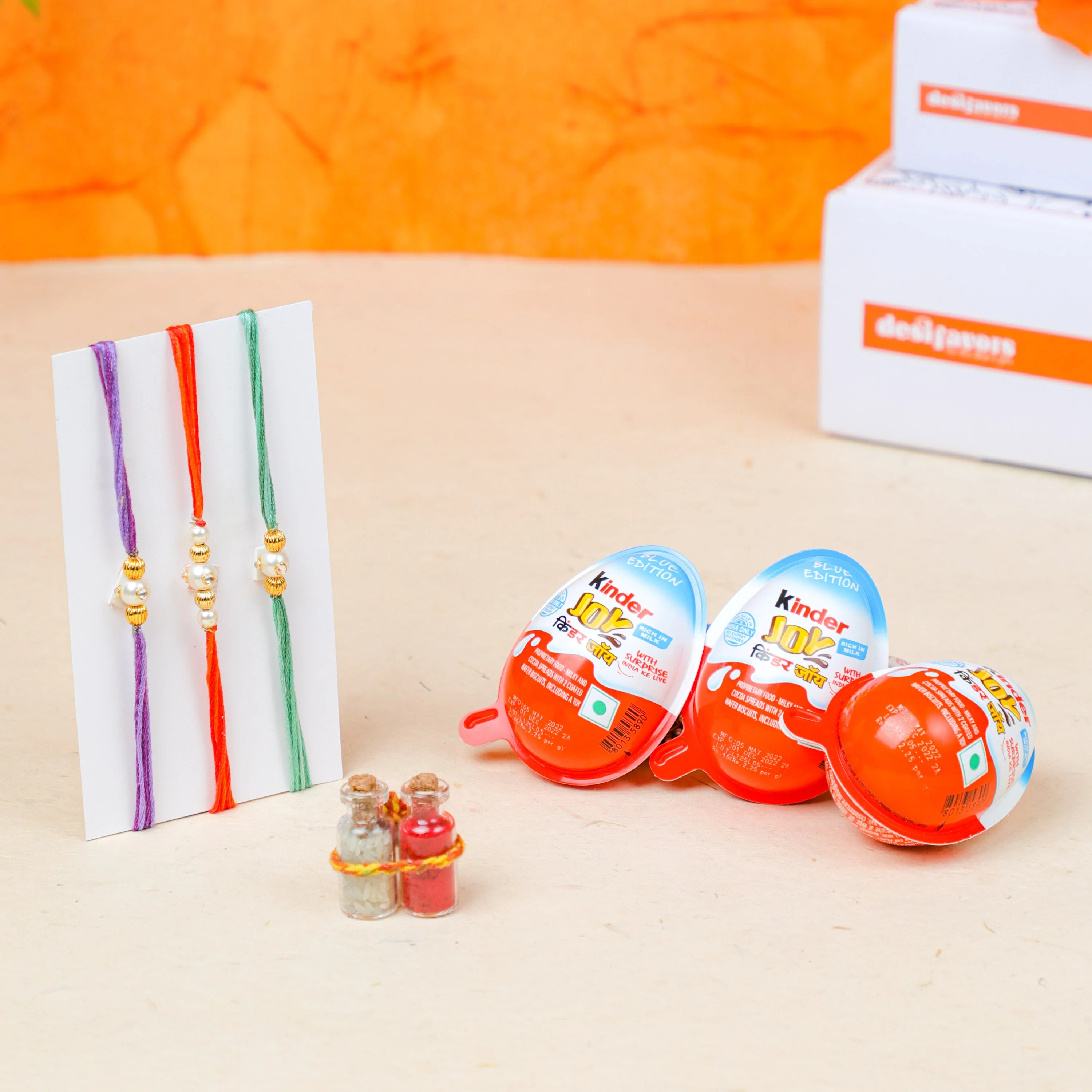 3 Kinder Joy with Pearl Rakhi and Roli-Chawal